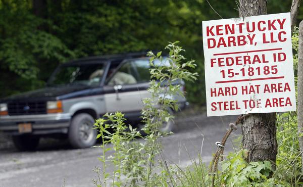 A guard sits in his truck at the entrance to the Darby Coal Mine in Holmes Mill, Kentucky, on May 20, 2006 - the day an explosion in the mine killed five miners. The owners of the mine later failed to pay nearly $3 million in penalties for mine safety vio A guard sits in his truck at the entrance to the Darby Coal Mine in Holmes Mill, Kentucky, on May 20, 2006 - the day an explosion in the mine killed five miners. The owners of the mine later failed to pay nearly $3 million in penalties for mine safety vio