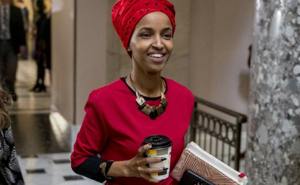 Rep. Ilhan Omar, D-Minn., walks through the halls of the Capitol Building in Washington. In Omar's Minnesota district, both Jews and Muslims voiced concern about her comments on Israel. Rep. Ilhan Omar, D-Minn., walks through the halls of the Capitol Building in Washington. In Omar's Minnesota district, both Jews and Muslims voiced concern about her comments on Israel.