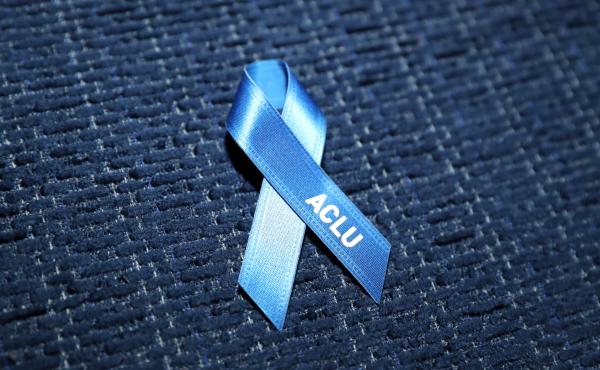 An ACLU pin is seen during a private dinner in Los Angeles in February. An ACLU pin is seen during a private dinner in Los Angeles in February.
