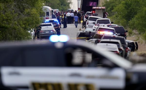 Police block the scene where a semitrailer with multiple dead bodies was discovered, Monday, June 27, 2022, in San Antonio. Police block the scene where a semitrailer with multiple dead bodies was discovered, Monday, June 27, 2022, in San Antonio.