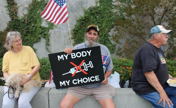 Steve Bova (center) traveled from Maryland to Los Angeles with the "People's Convoy" to protest covid-19 restrictions. Despite using a phrase that originated with the abortion rights movement, he opposes abortion. Steve Bova (center) traveled from Maryland to Los Angeles with the "People's Convoy" to protest covid-19 restrictions. Despite using a phrase that originated with the abortion rights movement, he opposes abortion.