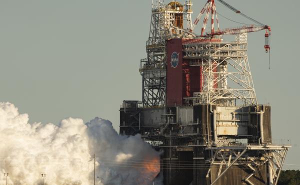 In this image provided by NASA, the core stage for the first flight of NASA's Space Launch System rocket is seen at NASA's Stennis Space Center near Bay St. Louis, Mississippi. The four engines fired for a little more than one minute. In this image provided by NASA, the core stage for the first flight of NASA's Space Launch System rocket is seen at NASA's Stennis Space Center near Bay St. Louis, Mississippi. The four engines fired for a little more than one minute.