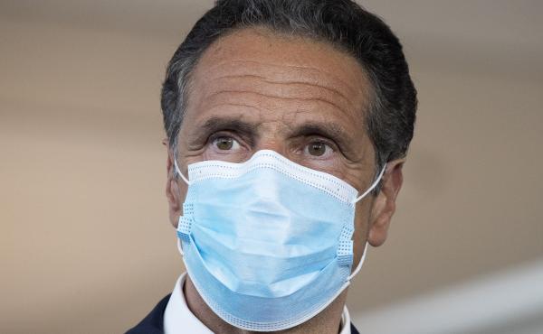 New York Gov. Andrew Cuomo, shown here at a news conference earlier this month, said Wednesday the travel advisory would go into effect midnight Thursday. New York Gov. Andrew Cuomo, shown here at a news conference earlier this month, said Wednesday the travel advisory would go into effect midnight Thursday.