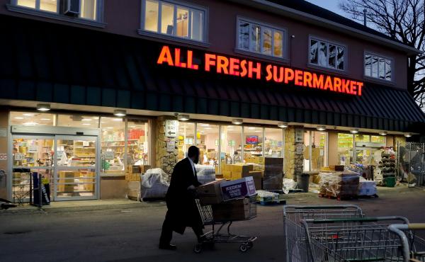 A man walks through the parking lot of a supermarket in New York's Rockland County, which has declared a state of emergency over a measles outbreak. A man walks through the parking lot of a supermarket in New York's Rockland County, which has declared a state of emergency over a measles outbreak.