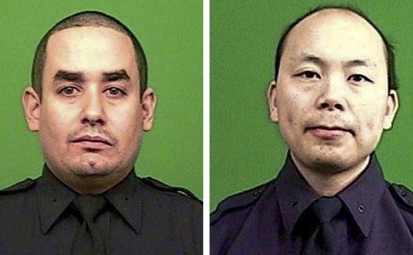 Officer Rafael Ramos (left) and Wenjian Liu were killed on Saturday in an attack by a gunman in a Brooklyn neighborhood. Officer Rafael Ramos (left) and Wenjian Liu were killed on Saturday in an attack by a gunman in a Brooklyn neighborhood.