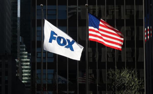 A flag with the new logo for FOX flies outside of the corporate headquarters on 6th Avenue on April 24, 2019 in New York City. A flag with the new logo for FOX flies outside of the corporate headquarters on 6th Avenue on April 24, 2019 in New York City.
