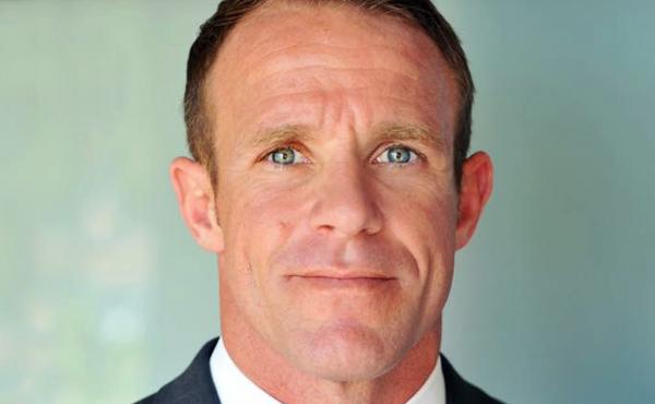 This 2018 photo provided by Andrea Gallagher shows her husband, Navy SEAL Edward Gallagher. Gallagher is facing charges of premeditated murder and other offenses in connection with the fatal stabbing of a teenage Islamic State prisoner under his care in I This 2018 photo provided by Andrea Gallagher shows her husband, Navy SEAL Edward Gallagher. Gallagher is facing charges of premeditated murder and other offenses in connection with the fatal stabbing of a teenage Islamic State prisoner under his care in I