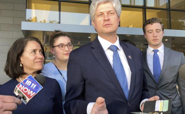 U.S. Rep. Jeff Fortenberry, R-Nebraska, center, speaks with the media outside the federal courthouse in Los Angeles, on Thursday. U.S. Rep. Jeff Fortenberry, R-Nebraska, center, speaks with the media outside the federal courthouse in Los Angeles, on Thursday.