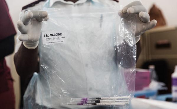 A health care worker holds doses of J&J vaccines at the Gandhi Phoenix Settlement in Bhambayi township, South Africa, on Sept. 24. A study of the J&J booster shot in the country had promising results against the omicron variant. A health care worker holds doses of J&J vaccines at the Gandhi Phoenix Settlement in Bhambayi township, South Africa, on Sept. 24. A study of the J&J booster shot in the country had promising results against the omicron variant.