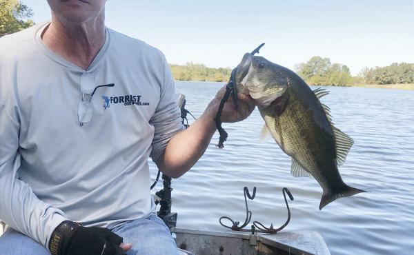 Mark Forrest is back fishing after rehabilitation with the IpsiHand device helped him regain use of his right hand. Mark Forrest is back fishing after rehabilitation with the IpsiHand device helped him regain use of his right hand.