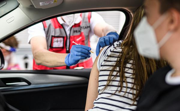 A woman receives the Johnson & Johnson COVID-19 at a drive-in vaccination event last week in Meerbusch, Germany. A woman receives the Johnson & Johnson COVID-19 at a drive-in vaccination event last week in Meerbusch, Germany.