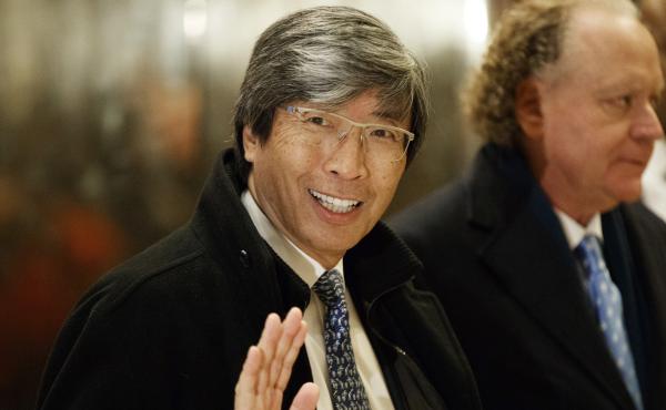 In this Jan. 10, 2017, file photo, pharmaceuticals billionaire Dr. Patrick Soon-Shiong waves as he arrives in the lobby of Trump Tower in New York for a meeting with President-elect Donald Trump. Soon-Shiong will take over the L.A. Times on Monday. In this Jan. 10, 2017, file photo, pharmaceuticals billionaire Dr. Patrick Soon-Shiong waves as he arrives in the lobby of Trump Tower in New York for a meeting with President-elect Donald Trump. Soon-Shiong will take over the L.A. Times on Monday.