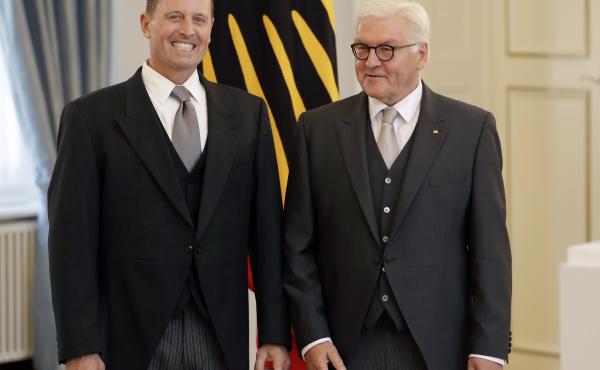 U.S. Ambassador to Germany Richard Grenell (left) and German President Frank-Walter Steinmeier greet the media during Grenell's accreditation process at the Bellevue Palace in Berlin on Tuesday. U.S. Ambassador to Germany Richard Grenell (left) and German President Frank-Walter Steinmeier greet the media during Grenell's accreditation process at the Bellevue Palace in Berlin on Tuesday.