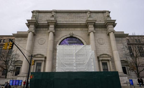 Scaffolding and tarp surround the remnants of the Equestrian Statue of former President Theodore Roosevelt at the entrance to the American Museum of Natural History in New York City on Wednesday. Scaffolding and tarp surround the remnants of the Equestrian Statue of former President Theodore Roosevelt at the entrance to the American Museum of Natural History in New York City on Wednesday.