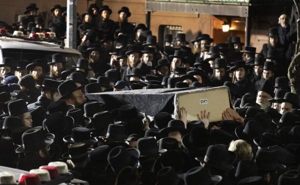 Orthodox Jewish men carry Moshe Deutsch's casket outside a Brooklyn synagogue earlier this month. Deutsch was killed in a shooting inside a Jersey City, N.J., kosher food market. Orthodox Jewish men carry Moshe Deutsch's casket outside a Brooklyn synagogue earlier this month. Deutsch was killed in a shooting inside a Jersey City, N.J., kosher food market.