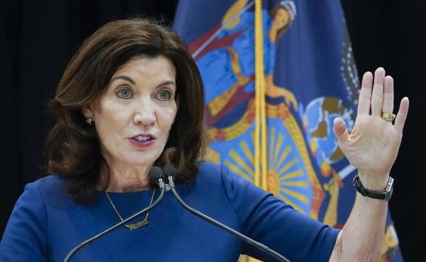 New York Gov. Kathy Hochul shortened the quarantine period for many essential workers even as infections have surged because of the omicron variant. New York Gov. Kathy Hochul shortened the quarantine period for many essential workers even as infections have surged because of the omicron variant.