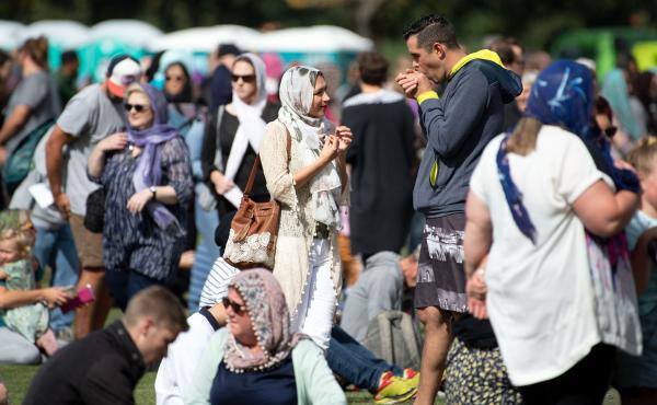 Women wore headscarves as they gathered for the Muslim call to prayer in Hagley Park in Christchurch on Friday. The call was broadcast across New Zealand in memory of 50 people who were killed in attacks at two mosques last Friday. Women wore headscarves as they gathered for the Muslim call to prayer in Hagley Park in Christchurch on Friday. The call was broadcast across New Zealand in memory of 50 people who were killed in attacks at two mosques last Friday.