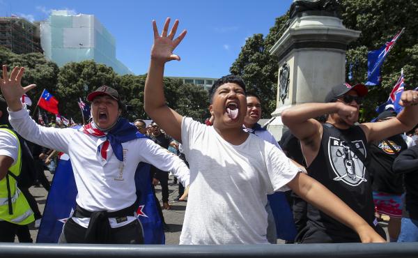 Vaccine mandate protestors perform a haka last week in Wellington, New Zealand. Vaccine mandate protestors perform a haka last week in Wellington, New Zealand.