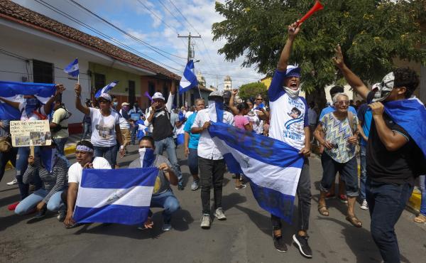 Anti-government demonstrators protest in Granada, Nicaragua. Hundreds of people have been killed in the government's brutal suppression of protests that erupted in April. Anti-government demonstrators protest in Granada, Nicaragua. Hundreds of people have been killed in the government's brutal suppression of protests that erupted in April.