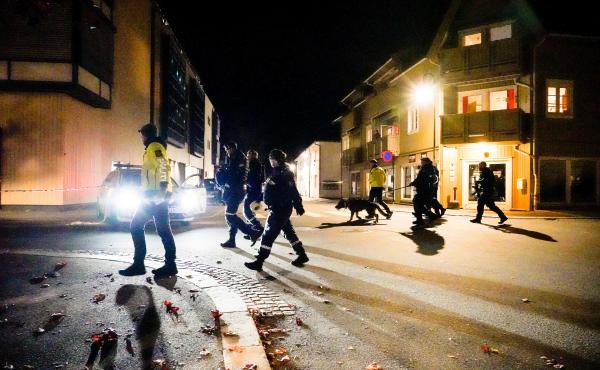 Police officers investigate a scene in Kongsberg, Norway, after a man armed with a bow killed several people before he was arrested Wednesday. Police officers investigate a scene in Kongsberg, Norway, after a man armed with a bow killed several people before he was arrested Wednesday.