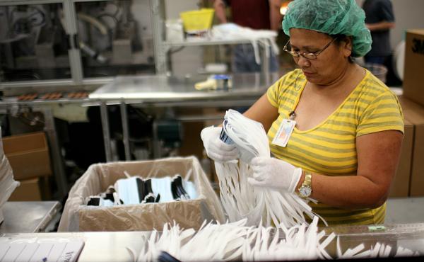 A Prestige Ameritech employee inspects disposable surgical masks in 2009 at the company's Texas factory. The company is one of the last domestic manufacturers of medical face masks. A Prestige Ameritech employee inspects disposable surgical masks in 2009 at the company's Texas factory. The company is one of the last domestic manufacturers of medical face masks.