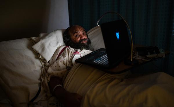 Maurice Miller lies in bed in his room at a nursing home in Takoma Park, Md., on Thursday. The Biden administration is planning to establish a federal minimum staffing requirement for nursing homes as part of a broader push to improve care for seniors and Maurice Miller lies in bed in his room at a nursing home in Takoma Park, Md., on Thursday. The Biden administration is planning to establish a federal minimum staffing requirement for nursing homes as part of a broader push to improve care for seniors and