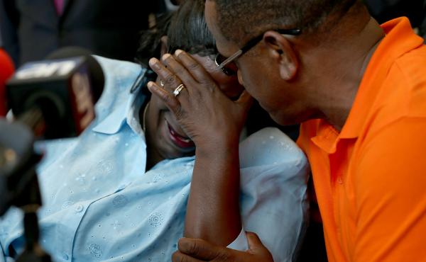 Lavall Hall's mother, Catherine Daniels, is comforted by her cousin Alfonzo Hill as she speaks with the media in February. Hall, who was schizophrenic, was fatally shot by police officers earlier this year. Lavall Hall's mother, Catherine Daniels, is comforted by her cousin Alfonzo Hill as she speaks with the media in February. Hall, who was schizophrenic, was fatally shot by police officers earlier this year.
