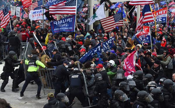 Pro-Trump supporters breeched security and stormed the U.S. Capitol on Jan. 6, 2021. Federal authorities as well as several local departments are looking into whether any off-duty officers were involved in the attack. Pro-Trump supporters breeched security and stormed the U.S. Capitol on Jan. 6, 2021. Federal authorities as well as several local departments are looking into whether any off-duty officers were involved in the attack.