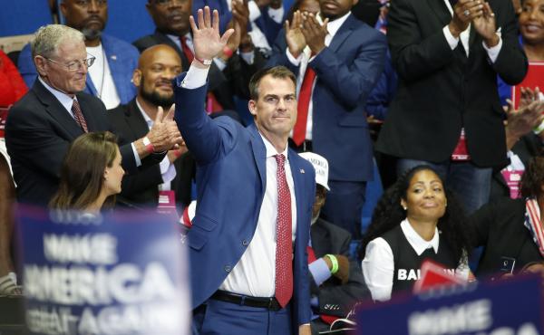 Oklahoma Gov. Kevin Stitt attends President Trump's campaign rally last month in Tulsa. Stitt dismisses the notion that he became infected at the June 20 event, saying it was too long ago. Oklahoma Gov. Kevin Stitt attends President Trump's campaign rally last month in Tulsa. Stitt dismisses the notion that he became infected at the June 20 event, saying it was too long ago.