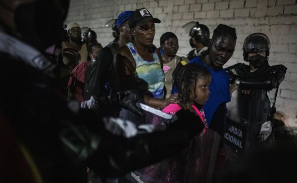 Haitian migrants boarding buses in Tapachula. Their encampment has been plagued with a lack of water, food and sanitation. Haitian migrants boarding buses in Tapachula. Their encampment has been plagued with a lack of water, food and sanitation.