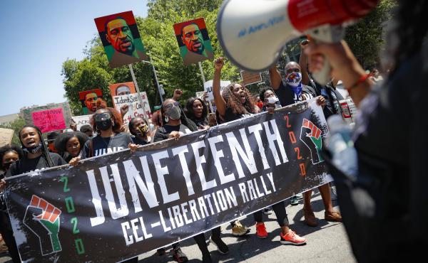 Protesters last year chanted as they marched after a Juneteenth rally at the Brooklyn Museum, in the Brooklyn borough of New York. Protesters last year chanted as they marched after a Juneteenth rally at the Brooklyn Museum, in the Brooklyn borough of New York.