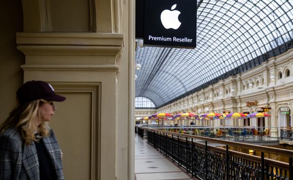 A woman passes by an Apple store at the GUM department store in central Moscow on April 27, 2021. Apple said this week that it's pausing the sale of its products in Russia. A woman passes by an Apple store at the GUM department store in central Moscow on April 27, 2021. Apple said this week that it's pausing the sale of its products in Russia.