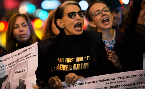 Protesters rail outside the Metropolitan Opera at Lincoln Center on opening night of the opera "The Death of Klinghoffer" on Monday in New York. Protesters rail outside the Metropolitan Opera at Lincoln Center on opening night of the opera "The Death of Klinghoffer" on Monday in New York.