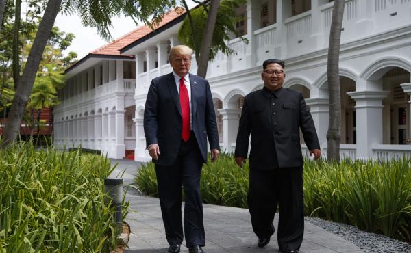 President Donald Trump walks with North Korean leader Kim Jong Un in Singapore in June. President Donald Trump walks with North Korean leader Kim Jong Un in Singapore in June.