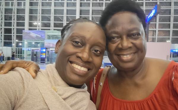 Jacqueline Muna Musiitwa, left, and her mom, Anne Sikwibele, at the airport in Lusaka, Zambia, in November. Musiitwa, who lives in Washington, D.C., is worried that her mom may not be able to visit the U.S. for Christmas. In an effort to stem the spread o Jacqueline Muna Musiitwa, left, and her mom, Anne Sikwibele, at the airport in Lusaka, Zambia, in November. Musiitwa, who lives in Washington, D.C., is worried that her mom may not be able to visit the U.S. for Christmas. In an effort to stem the spread o