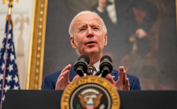 President Biden speaks on his administration's response to the economic crisis in the State Dining Room of the White House on Friday. President Biden speaks on his administration's response to the economic crisis in the State Dining Room of the White House on Friday.
