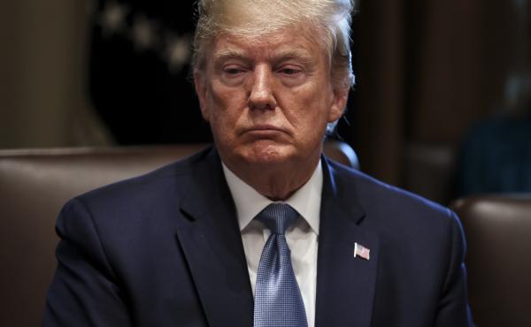 President Trump listens during a meeting in the Cabinet Room of the White House in Washington, D.C., on Tuesday. President Trump listens during a meeting in the Cabinet Room of the White House in Washington, D.C., on Tuesday.