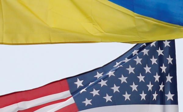 Ukrainian and U.S. flags fly in Kyiv, Ukraine. Ukrainian and U.S. flags fly in Kyiv, Ukraine.