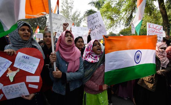 Demonstrators protest against the Citizenship Amendment Act near Jamia Millia Islamia on Dec. 15 in New Delhi. Demonstrators protest against the Citizenship Amendment Act near Jamia Millia Islamia on Dec. 15 in New Delhi.