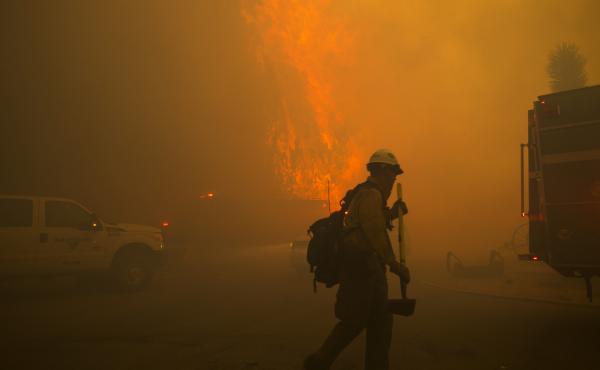 A firestorm engulfs the Mormon Rocks area in the San Bernardino National Forest off State Highway 138 in Phelan, Calif., as the Bluecut Fire rages out of control Tuesday afternoon. A firestorm engulfs the Mormon Rocks area in the San Bernardino National Forest off State Highway 138 in Phelan, Calif., as the Bluecut Fire rages out of control Tuesday afternoon.
