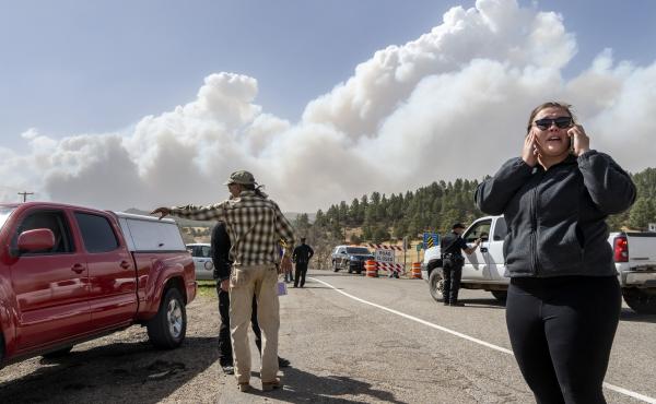 Kylee Moberg tries to get through a road block on N.M. 94 to get to her friend and horses on Friday. Destructive Southwest fires have burned dozens of homes in northern Arizona and put numerous small villages in New Mexico in the path of danger. Kylee Moberg tries to get through a road block on N.M. 94 to get to her friend and horses on Friday. Destructive Southwest fires have burned dozens of homes in northern Arizona and put numerous small villages in New Mexico in the path of danger.