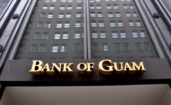 Dozens of people in Micronesia are suing the Bank of Guam for seizing stimulus checks they deposited. The bank did so to help the IRS recover tax payments issued in error. Dozens of people in Micronesia are suing the Bank of Guam for seizing stimulus checks they deposited. The bank did so to help the IRS recover tax payments issued in error.