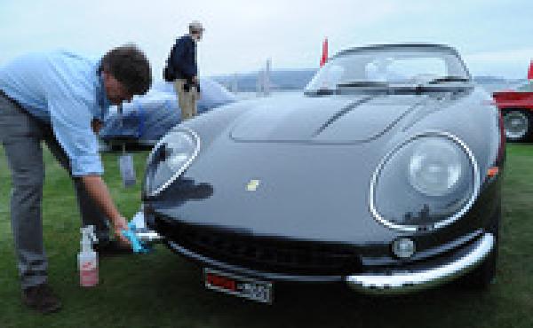Dan Schaefer does a last minute detail before judging on the 1968 Ferrari 275 GTS/4 Scaglietti NART Spider owned by Chris and Ann Cox, Chapel Hill, N.C. Just 10 examples of this car were built and this is tenth one. Dan Schaefer does a last minute detail before judging on the 1968 Ferrari 275 GTS/4 Scaglietti NART Spider owned by Chris and Ann Cox, Chapel Hill, N.C. Just 10 examples of this car were built and this is tenth one.