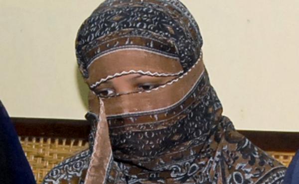 Asia Bibi, photographed in 2010, listens to officials at a prison near Lahore. Asia Bibi, photographed in 2010, listens to officials at a prison near Lahore.