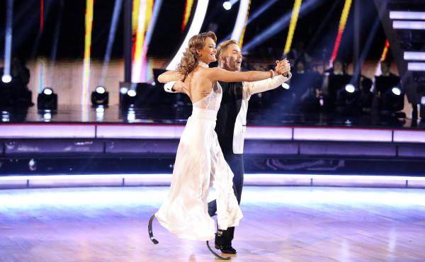 Amy Purdy, who lost both lower legs because of bacterial meningitis, performs with Derek Hough on Dancing With The Stars. Amy Purdy, who lost both lower legs because of bacterial meningitis, performs with Derek Hough on Dancing With The Stars.