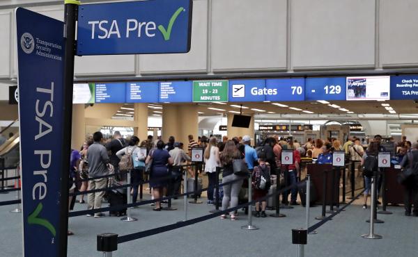 Air passengers heading to their departure gates enter TSA PreCheck at Orlando International Airport. Access to PreCheck could now be revoked for unruly passengers. Air passengers heading to their departure gates enter TSA PreCheck at Orlando International Airport. Access to PreCheck could now be revoked for unruly passengers.