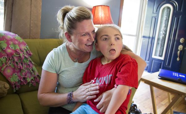 Brenda Hummel and her 7-year-old daughter Andrea in their home near Des Moines, Iowa. Andrea was born with severe epilepsy and gets her health care through Medicaid. Brenda Hummel and her 7-year-old daughter Andrea in their home near Des Moines, Iowa. Andrea was born with severe epilepsy and gets her health care through Medicaid.