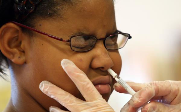 Fourth-grader Jasmine Johnson got a FluMist spray at her Annapolis, Md., elementary school in 2007. This year, the nasal spray vaccine isn't recommended. Fourth-grader Jasmine Johnson got a FluMist spray at her Annapolis, Md., elementary school in 2007. This year, the nasal spray vaccine isn't recommended.