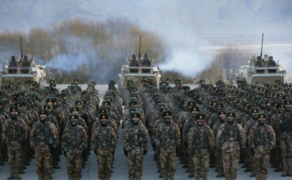 This Jan. 4 photo shows Chinese People's Liberation Army soldiers assembling during military training at Pamir Mountains in Kashgar, northwestern China's Xinjiang region. This Jan. 4 photo shows Chinese People's Liberation Army soldiers assembling during military training at Pamir Mountains in Kashgar, northwestern China's Xinjiang region.