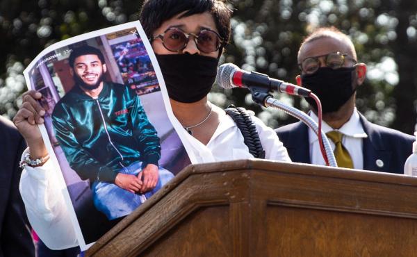 Tamika Morales holds a photo of her son, Ahmad, who was killed in South Philadelphia last July. Tamika Morales holds a photo of her son, Ahmad, who was killed in South Philadelphia last July.
